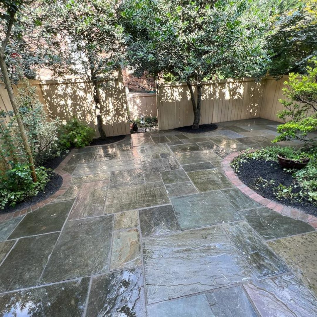 Wet flagstone patio.