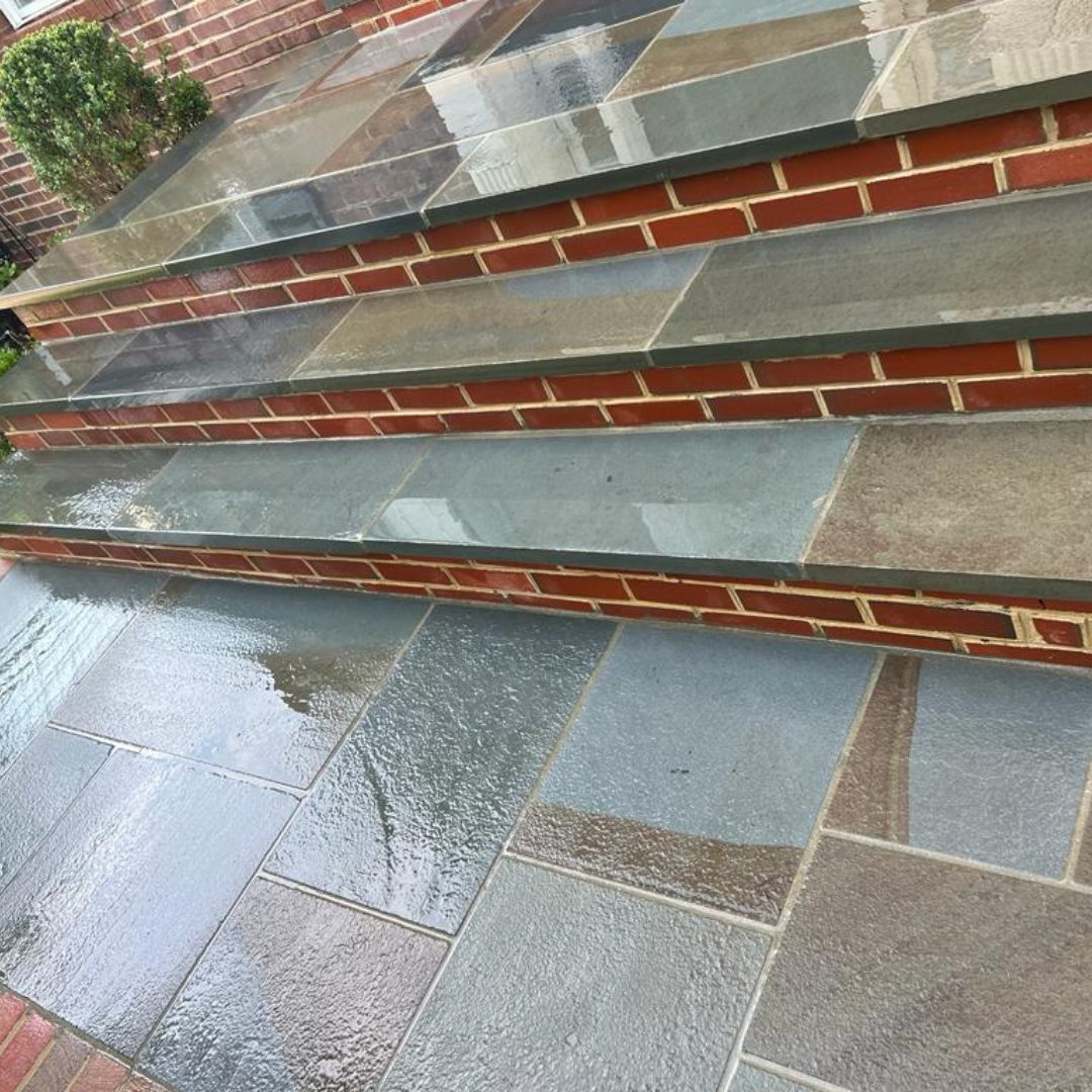 Stone steps and patio, wet.