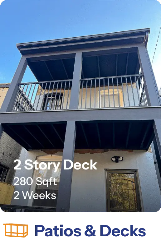 Two-story deck showcasing a modern design, measuring 280 square feet, completed in two weeks. Ideal for enhancing outdoor living spaces.