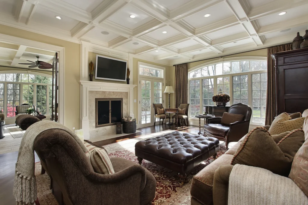 Family room addition with leather furniture and natural lighting