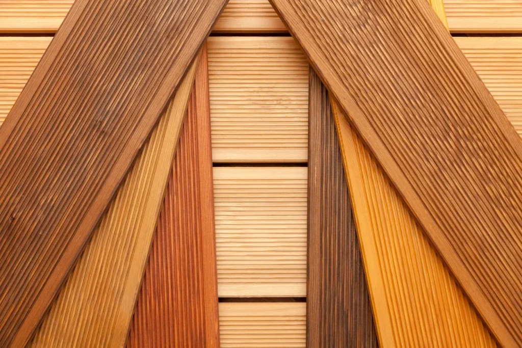 Various textured wooden planks arranged diagonally in different shades.