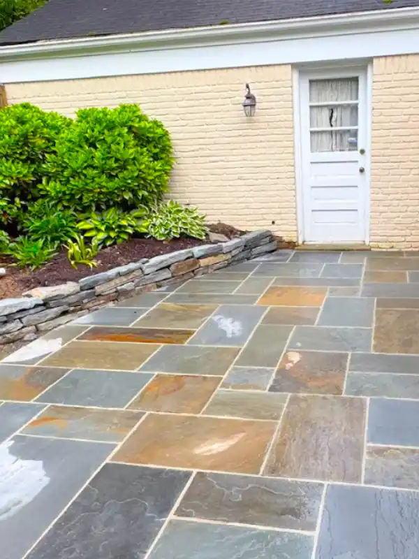Flagstone walkway installed by Blue Collar Scholars hardscape contractors in Potomac, MD
