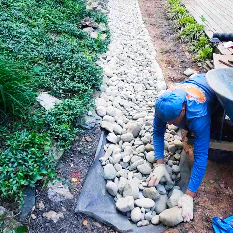 Drainage contractor installing a drainage solution in Marlyland