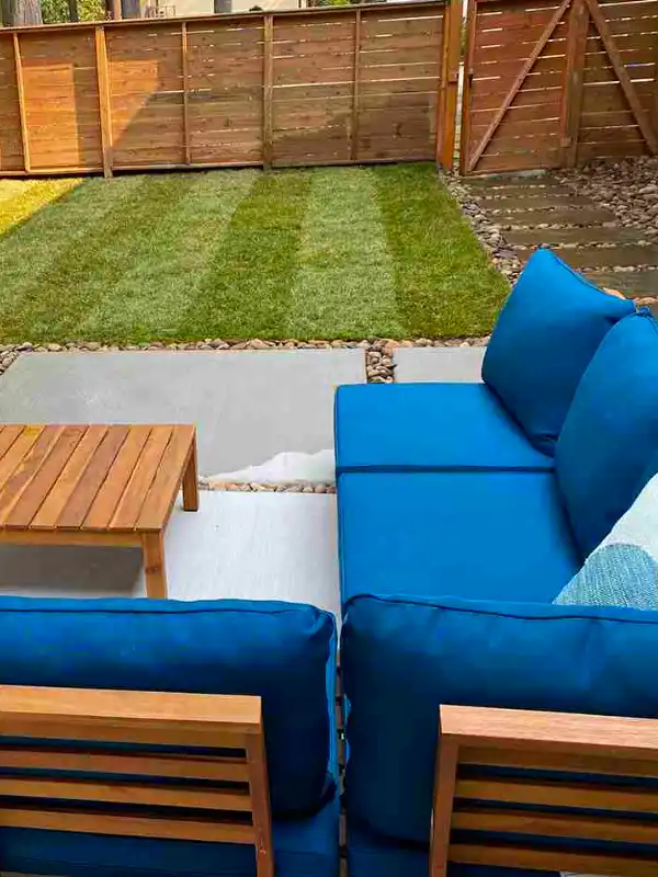 Complete patio construction with permeable stones, recent landscape maintenance and a custom flagstone walkway