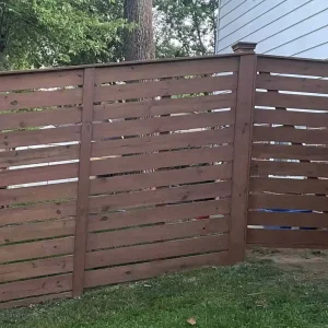 brown wooden fence repair