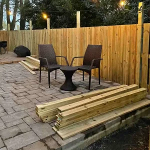 outdoor retreat with privacy fence installation
