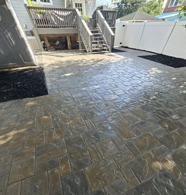 Different angle of the paver patio with defined mulch beds