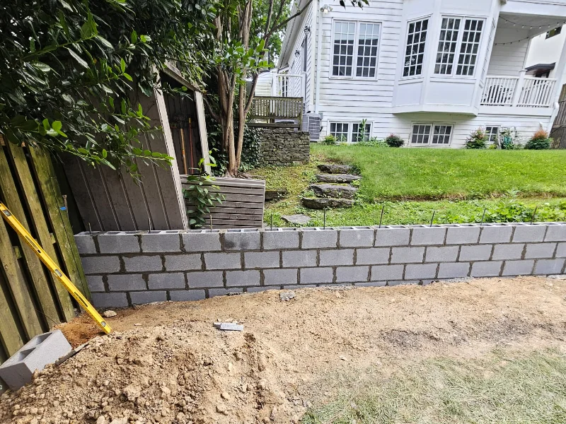 CMU retaining wall construction in progress