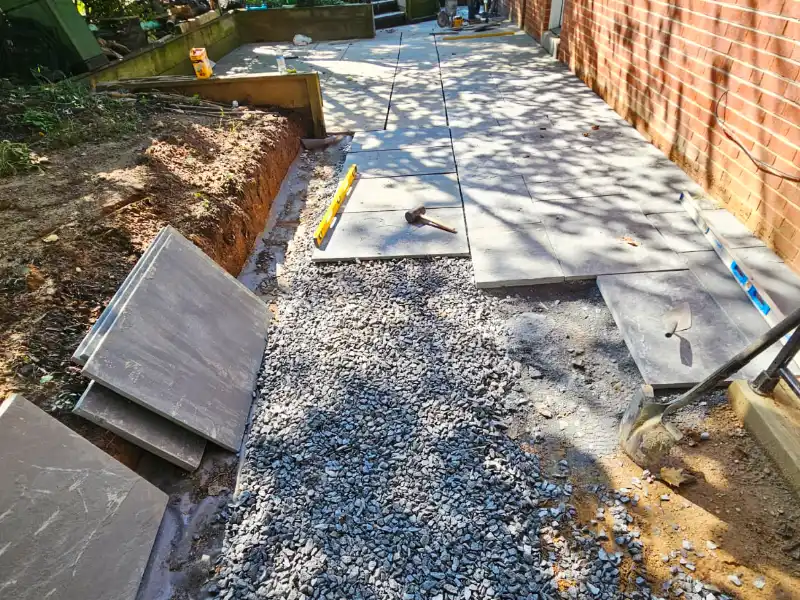 installing the flagstone walkway with the patio