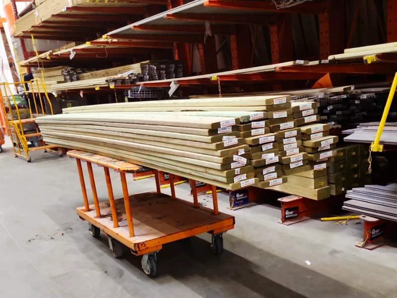 Pressure treated lumber prepared for stair reconstruction project