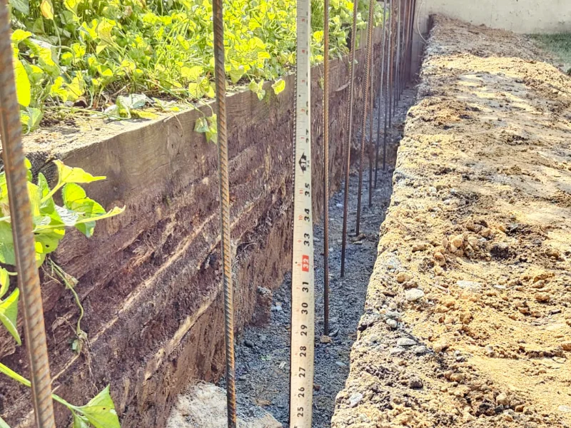 Retaining wall footing depth measurement during excavation in Bethesda MD
