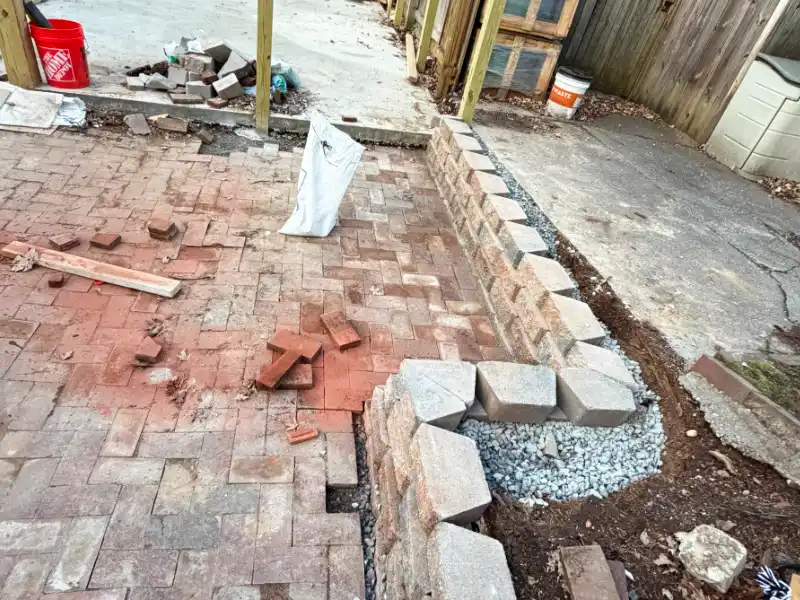 retaining wall with brick preparation for shed